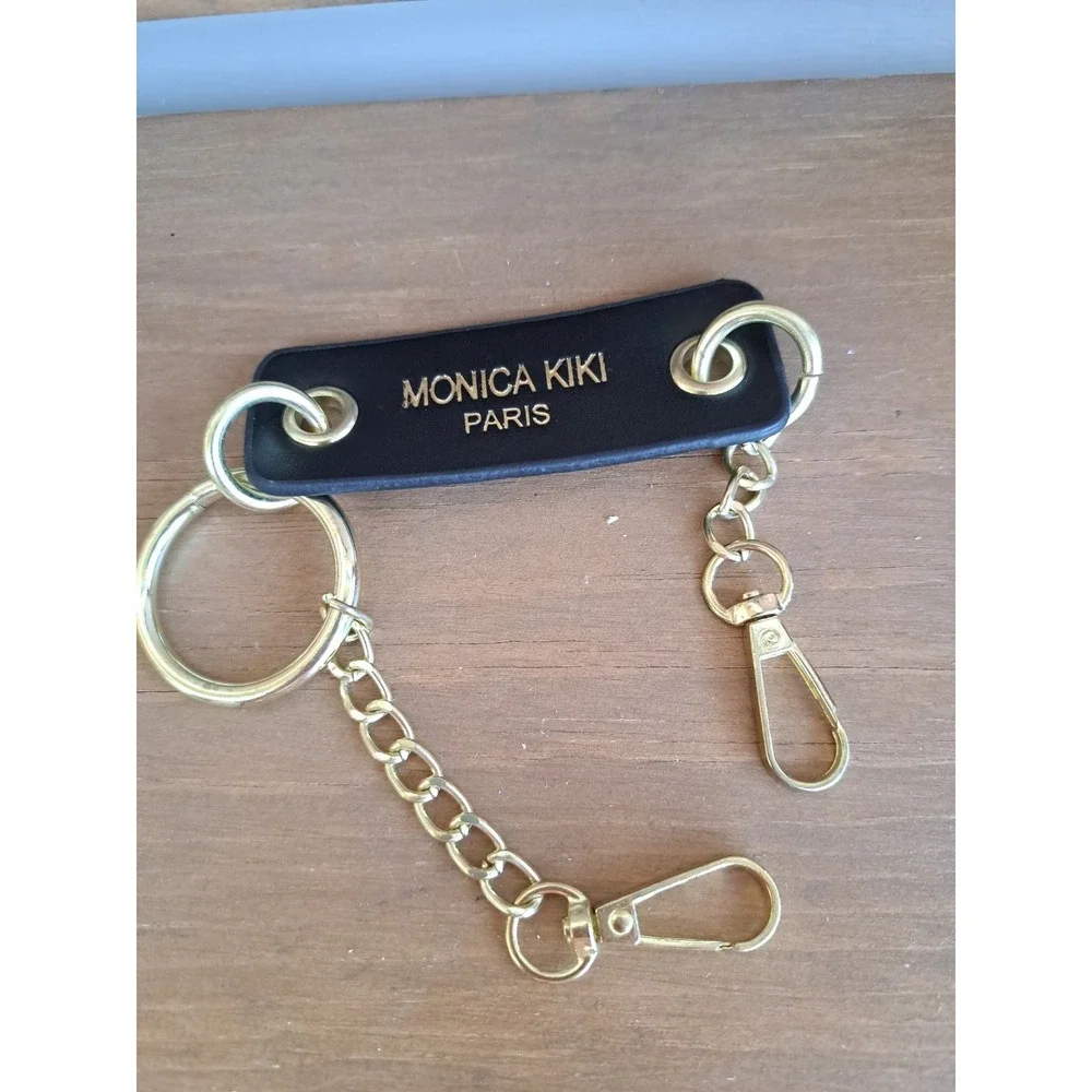 Monica Kiki Paris Keychain‎ With Black Leather Strap Gold-Tone Hardware